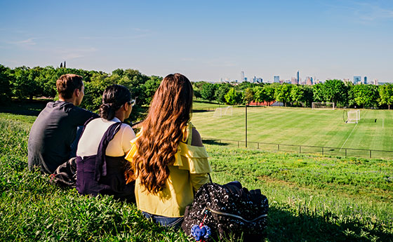 Students look towards downtown 3 miles from the hilltop