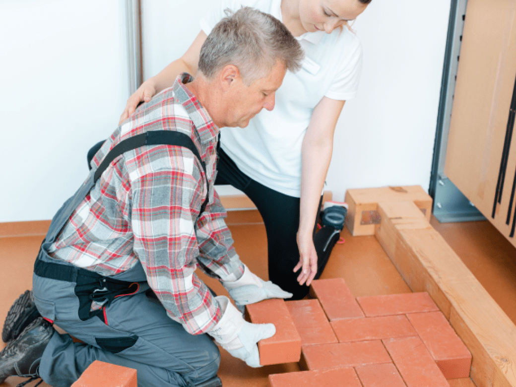 OT Professional shows a patient safe techniques for his work