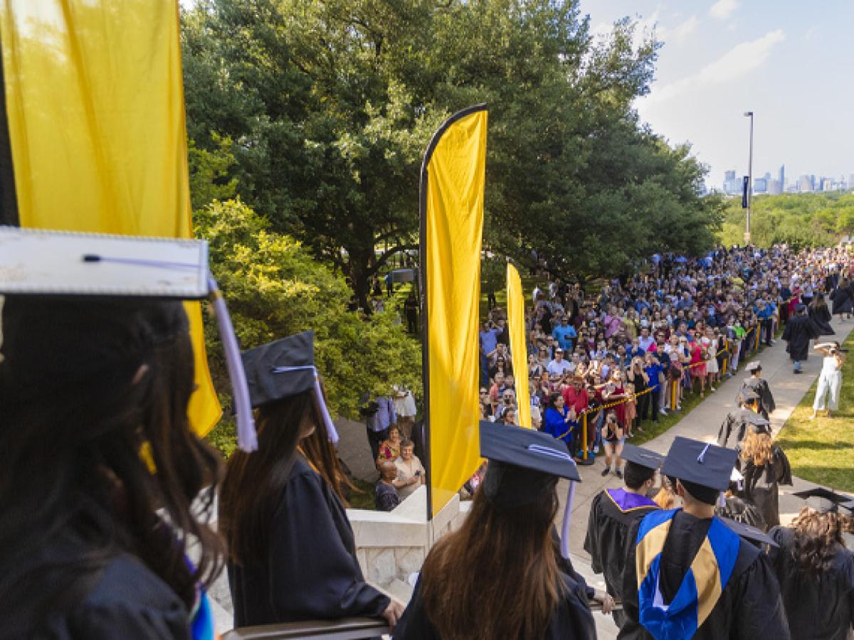 Students exit the Red Doors at the 2022 Spring Legacy Walk.