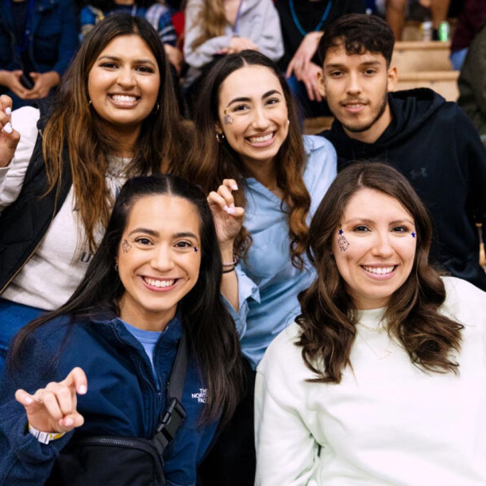 Fans cheering at a game 