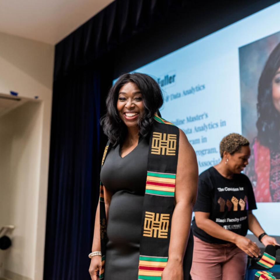 student at black student graduation