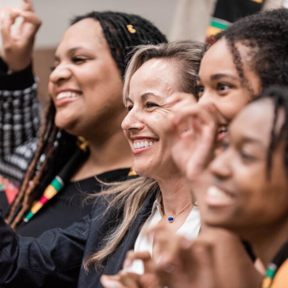 president fuentes at black student graduation with several students