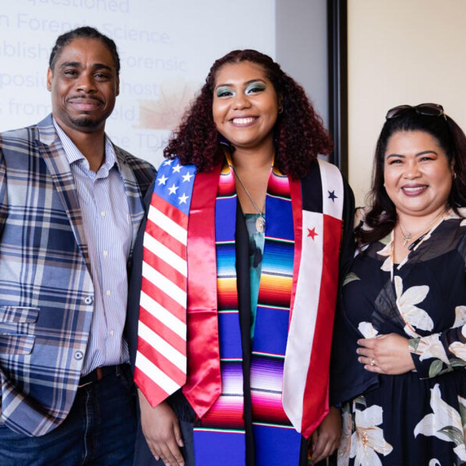 graduate posing for asian graduation ceremony