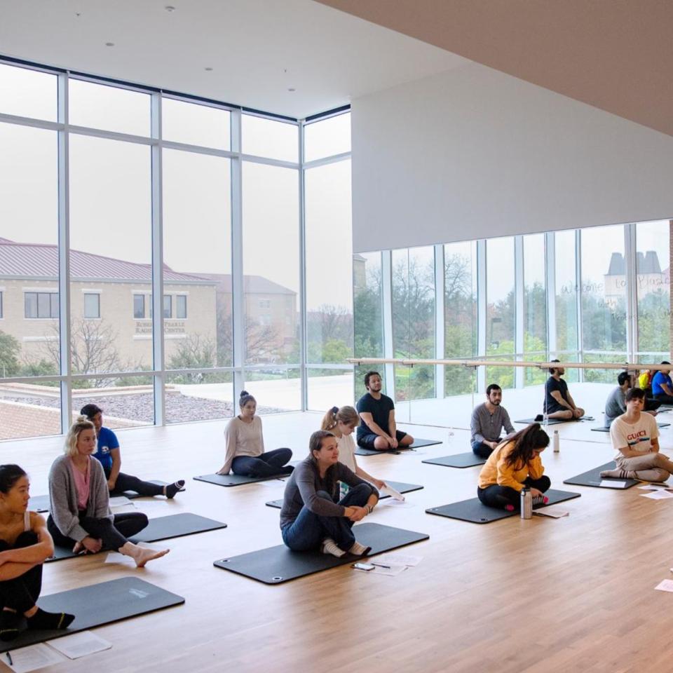 A yoga class taking place on St. Edwards Campus