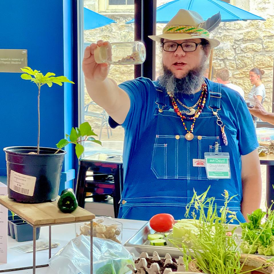 Students learn how to turn scraps into fresh produce during Earth Week.