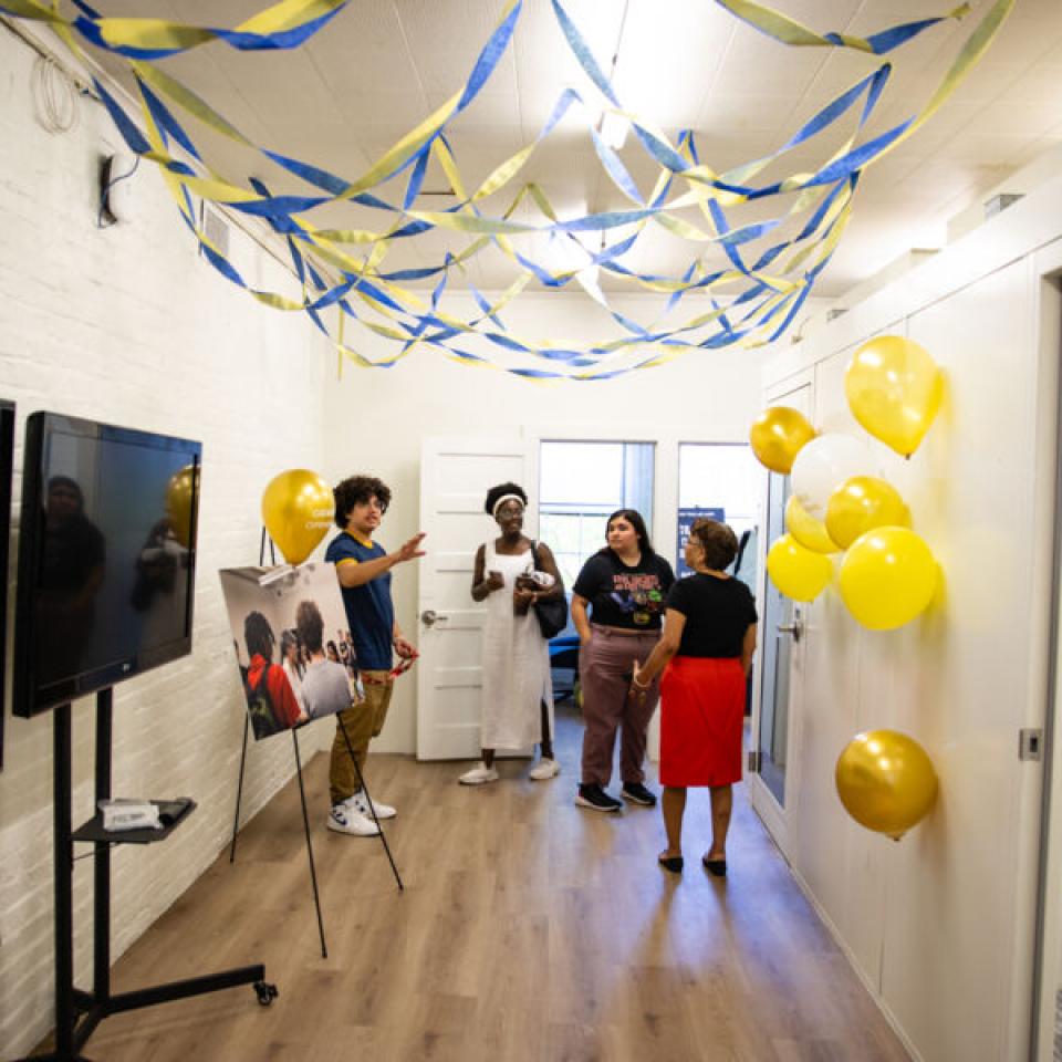 Hilltoppers celebrate the grand opening of the new Carriage House space for the Kozmetsky Center.