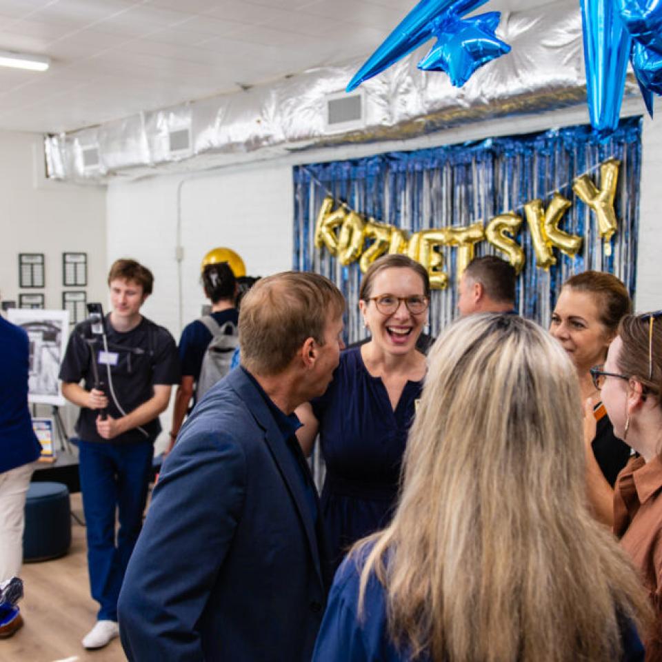 Hilltoppers celebrate the grand opening of the new Carriage House space for the Kozmetsky Center.