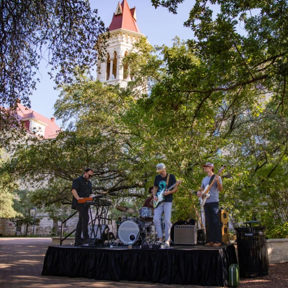 Hilltoppers celebrate the grand opening of the new Carriage House space for the Kozmetsky Center.