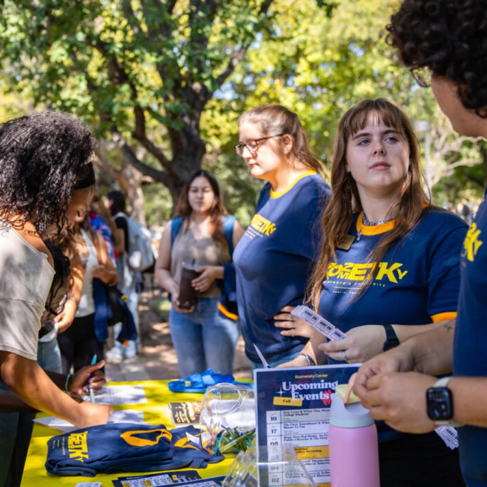 Hilltoppers celebrate the grand opening of the new Carriage House space for the Kozmetsky Center.