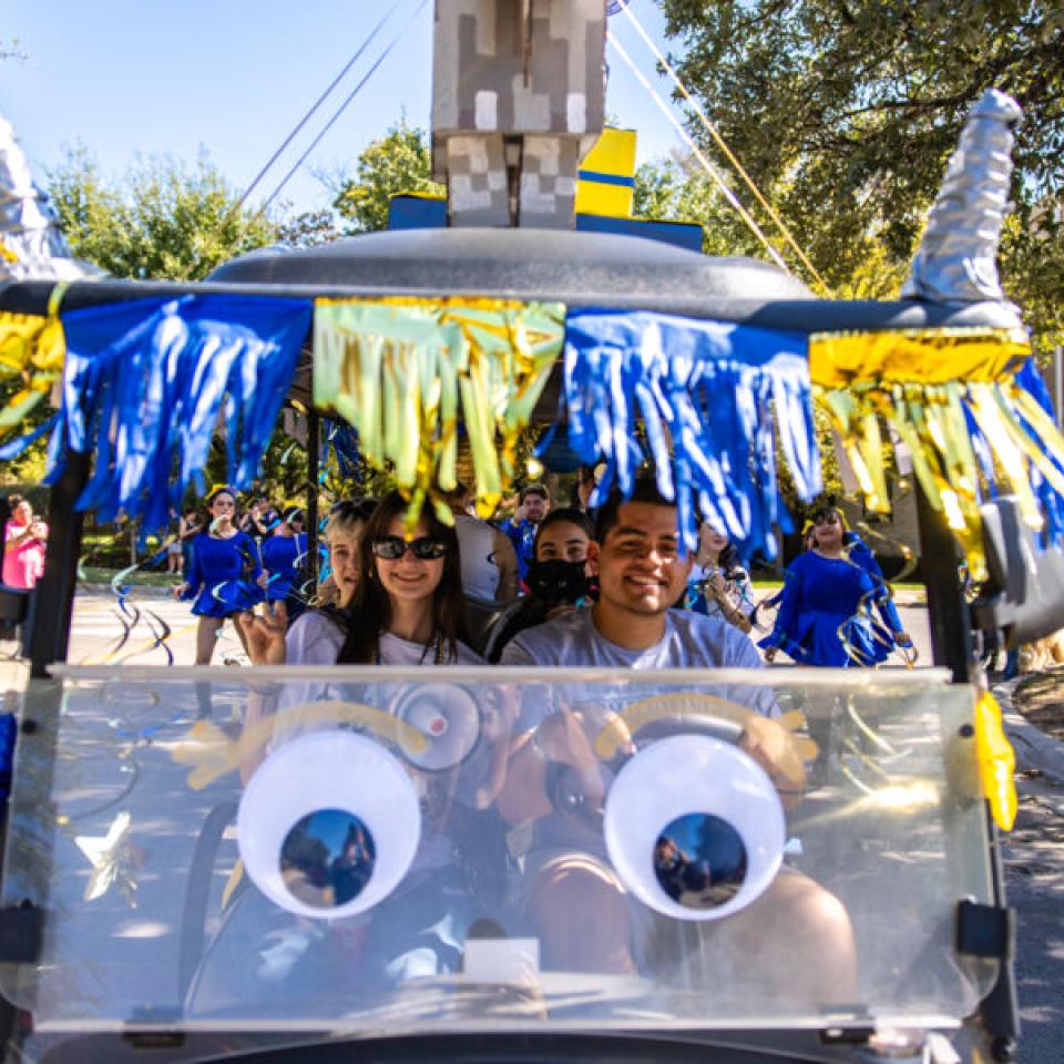 Topper Mobile decked out in Blue and Gold during the Homecoming Parade.