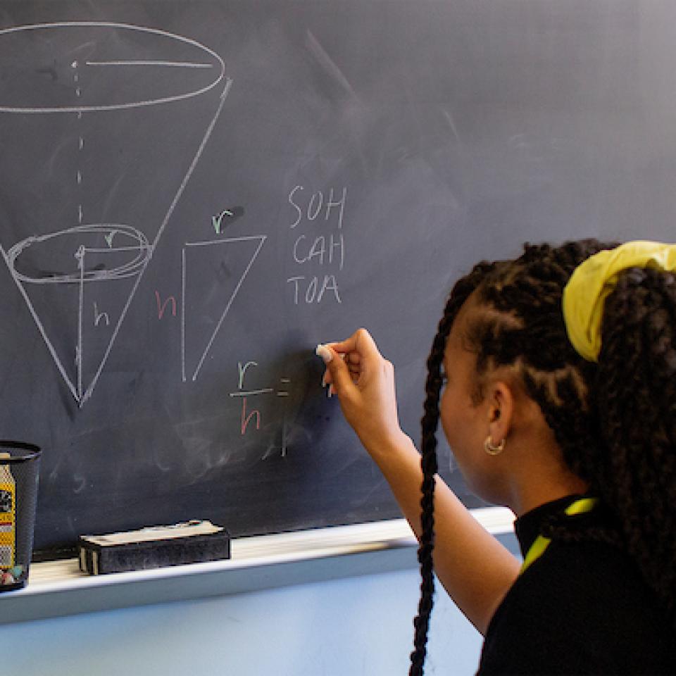 Girl at chalk board