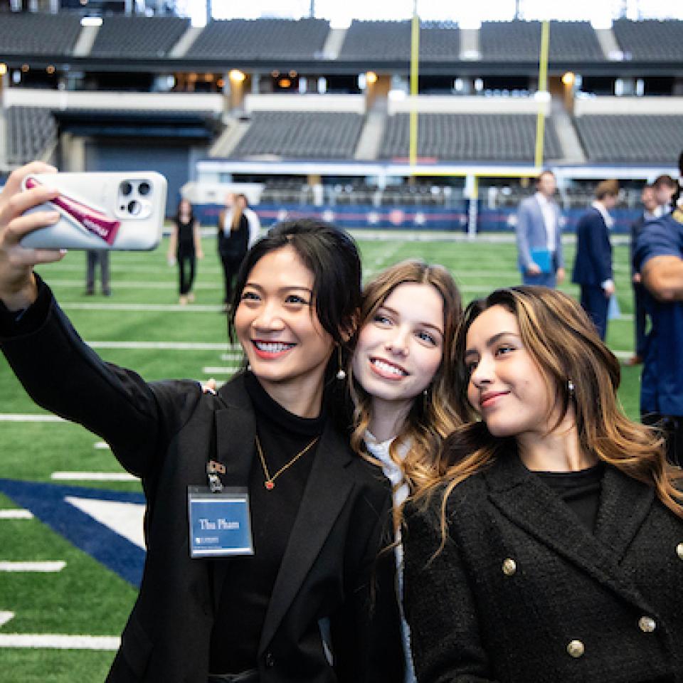 Three students at game