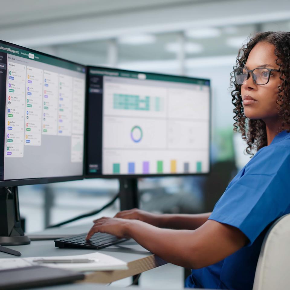 Healthcare data person at desk