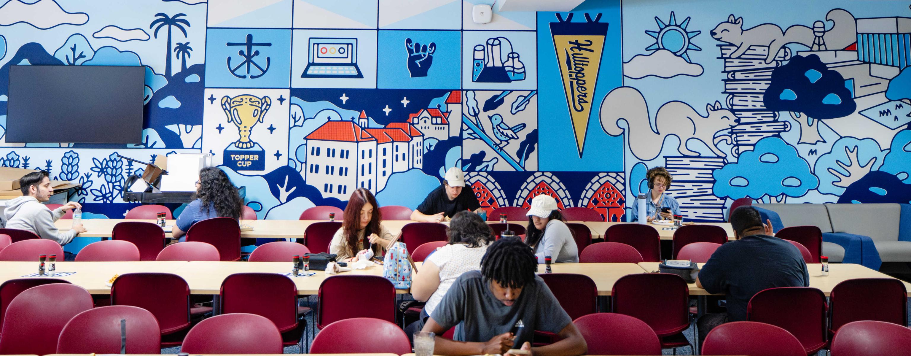 St. Edward's students eating in the dining hall at Ragsdale Center on campus.