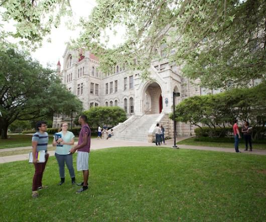Students on campus in front of Main Building