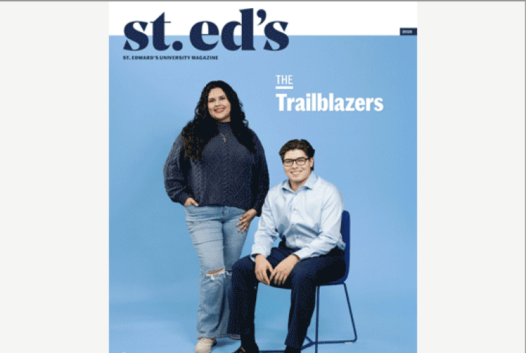 SP26 Magazine Cover involving two people standing in front of a blue background
