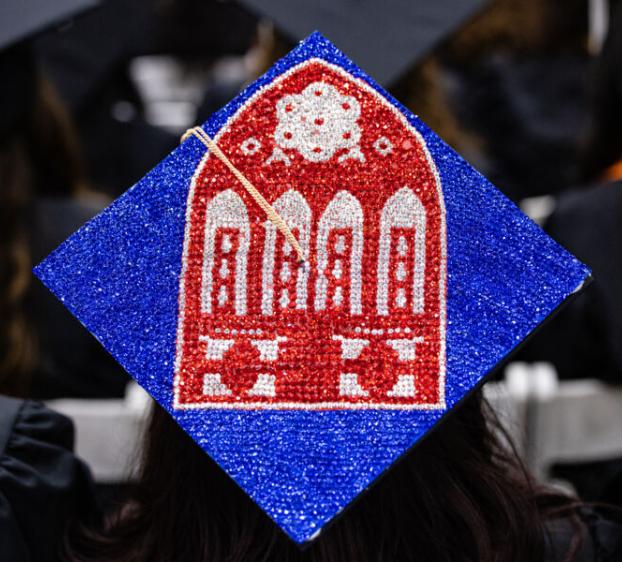 Graduation cap with a design on Main Building.