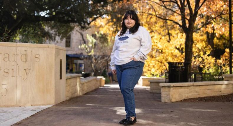Victoria Oseguera stands on campus at St. Edward's University