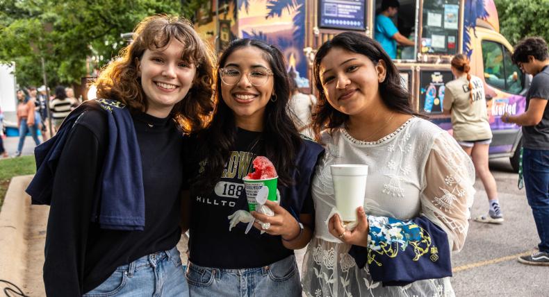 Students posing with sno cones at Hillfest 