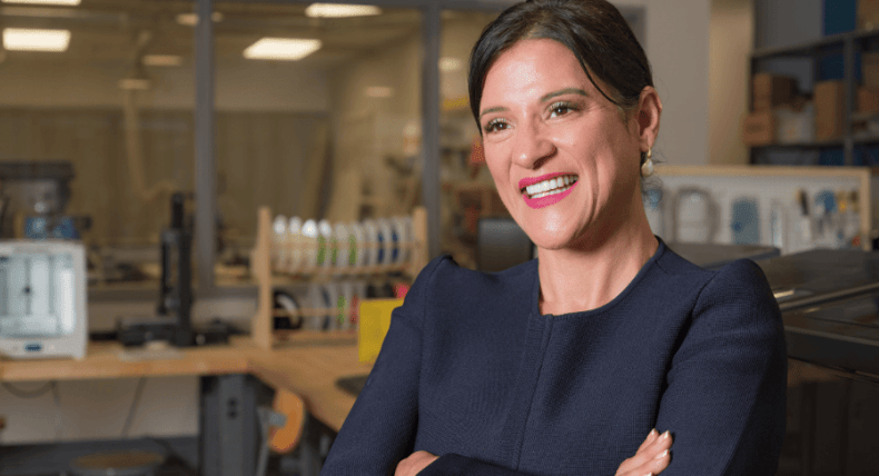 Claudia Aguirre poses at her office