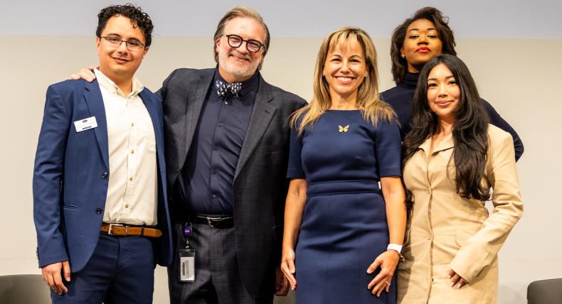 President Montserrat Fuentes joins the chancellor of Austin Community College and three transfer students for a group photo.