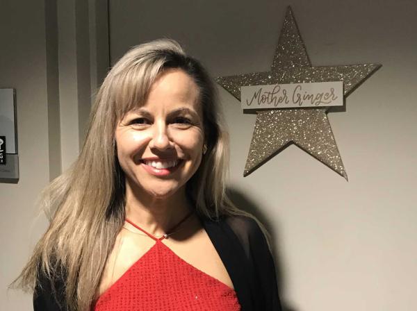 President Fuentes in front of her dressing room at the nutcracker 
