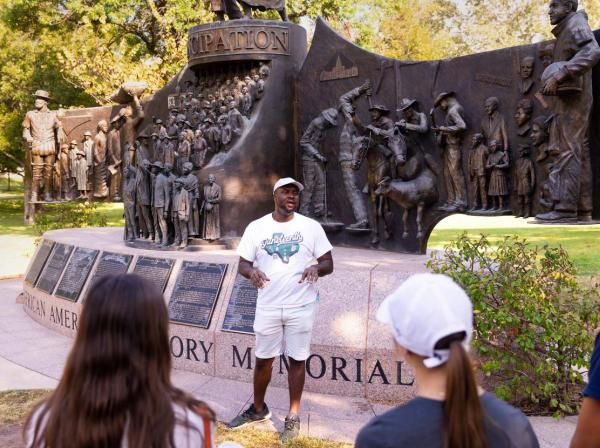 Javier Wallace leading the Black Austin Tour at the State Capitol