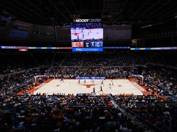 Wide shot of the basketball game between St. Edward's and UT