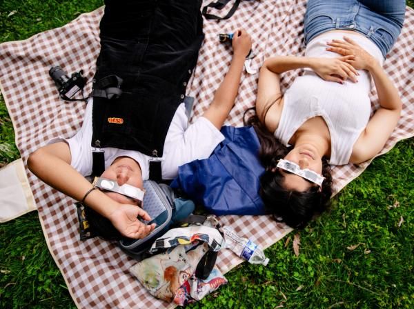 Students enjoy the Total Solar Eclipse on campus with proper eyewear