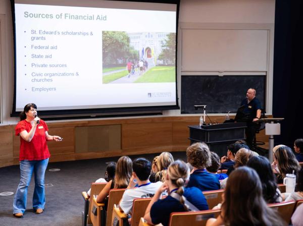 Senior Director of Student Financial Aid speaking to students on how to pay for college.