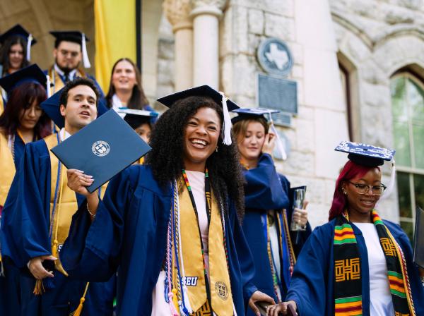 Graduates Exit Main Building During Legacy Walk
