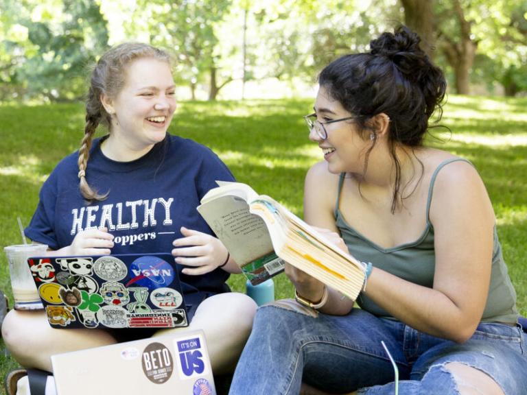students talking outside
