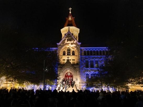 A picture of main building lit up during Festival of Lights