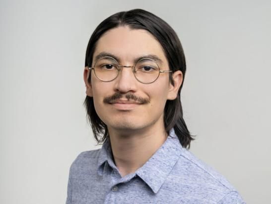 Portrait of Michael Longoria, a financial services counselor at St. Edward's University.