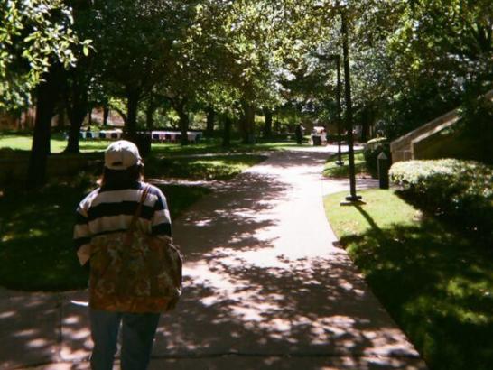 Student Sam Griffith walking through campus