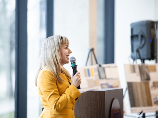 President Montserrat Fuentes speaking at the grand opening for the School of Health Sciences reception.