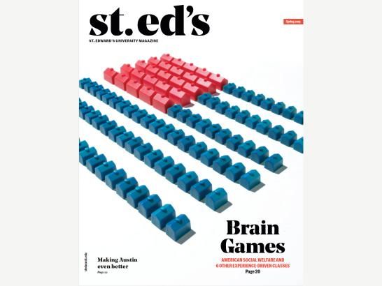 Small plastic red, white, and blue houses arranged to look like the American Flag, with the phrase "Brain Games" underneath them