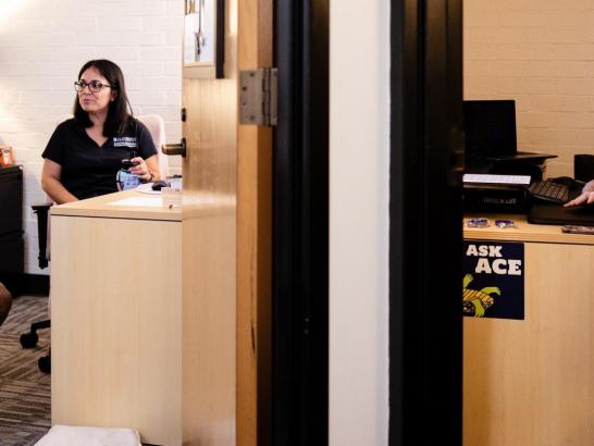 Students talking with success coaches.