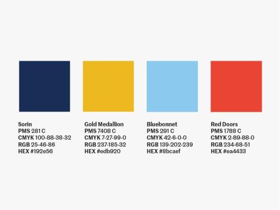 Four examples from the St. Edward's color palette: a dark blue, gold, light blue and red
