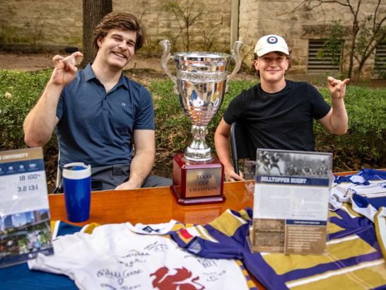 Students promoting their club or activity at the student involvement fair