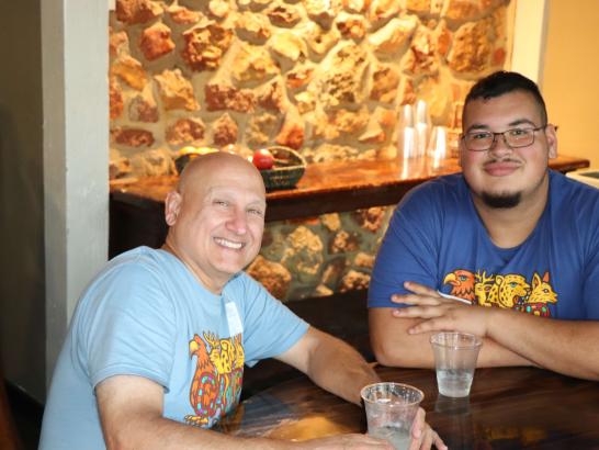 Professor Lopez and a student meeting