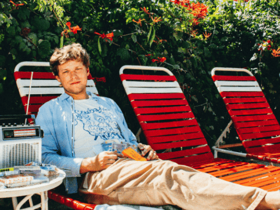 Christopher Chandler poses poolside. 