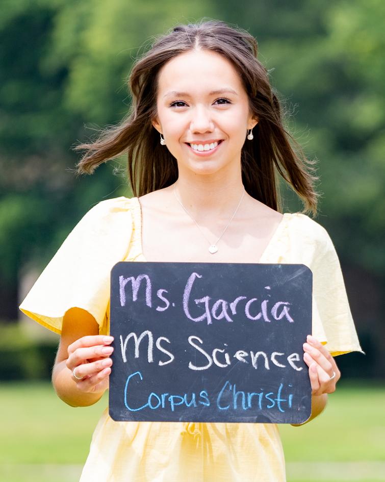 Sierra Garcia poses with sign