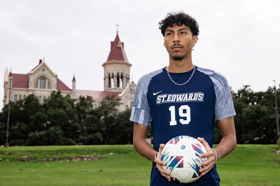 Student, Irvin Abarca poses in front of Main Building