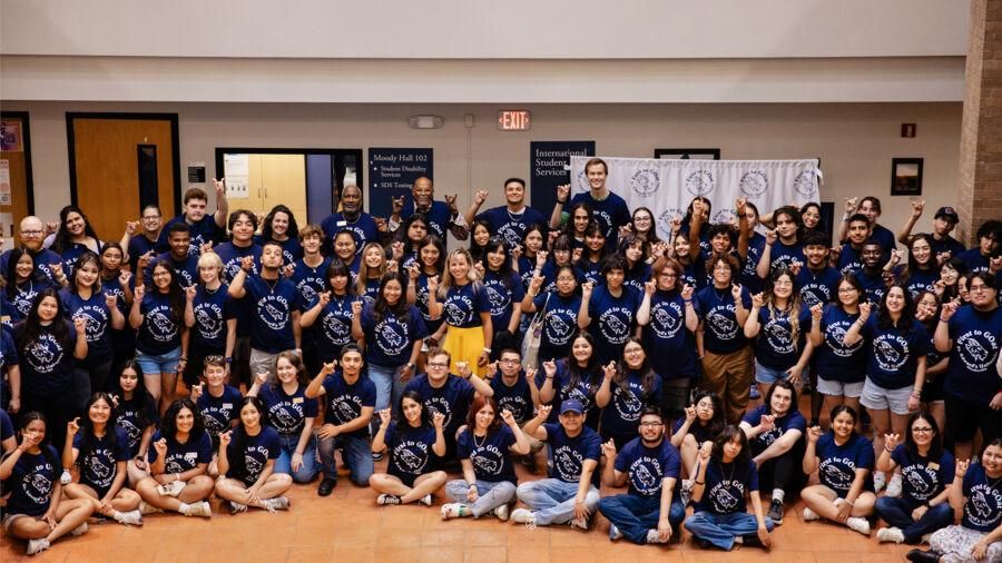 First-generation students pose for a photo during "First to GOat" Event.