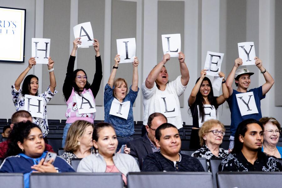 Family and friends cheering on Nursing students at the White Coat Ceremony.