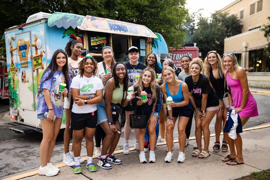 Students enjoy snow cones at the Block Party during Anchors.
