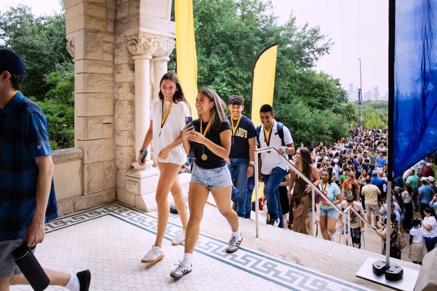 New students participate in the Legacy Walk as they enter the Red Doors at Main Building.