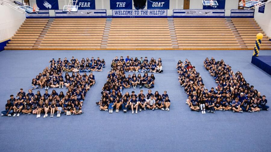 Freshman posing for a class of 2028 group photo.