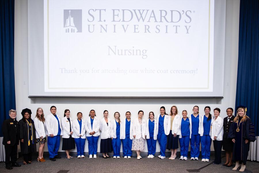 Nursing students receive their white coats at the first-ever White Coat ceremony at St. Edward's.